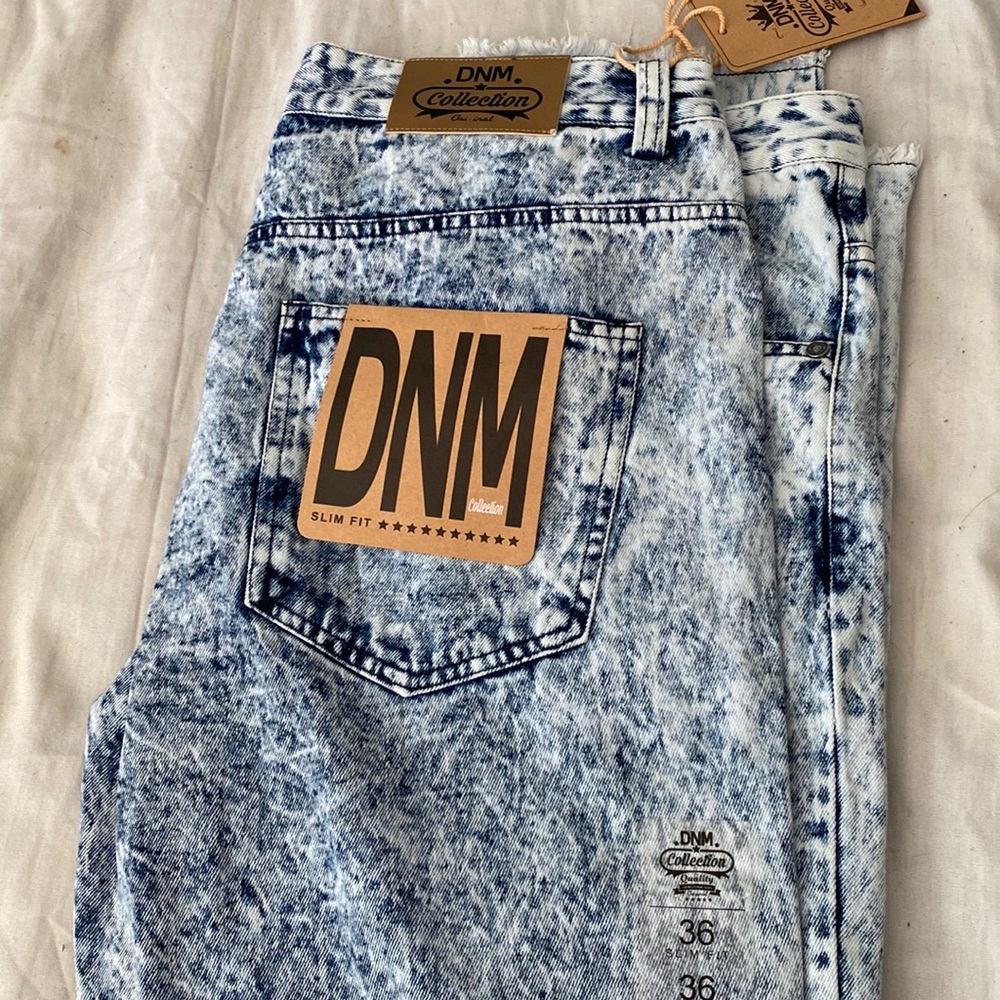 Acid washed blue jeans